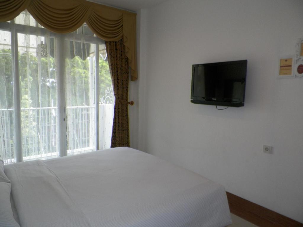 The Victoria Guesthouse Бандунг Номер фото